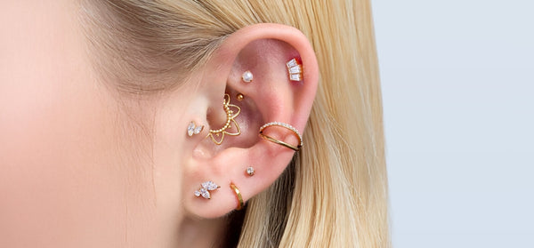 gold earrings curved bar helix earring